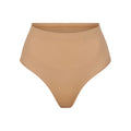 SEAMLESS SCULPT MID WAIST THONG | OCHRE